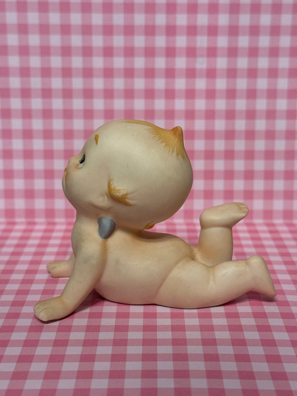 Laying Kewpie