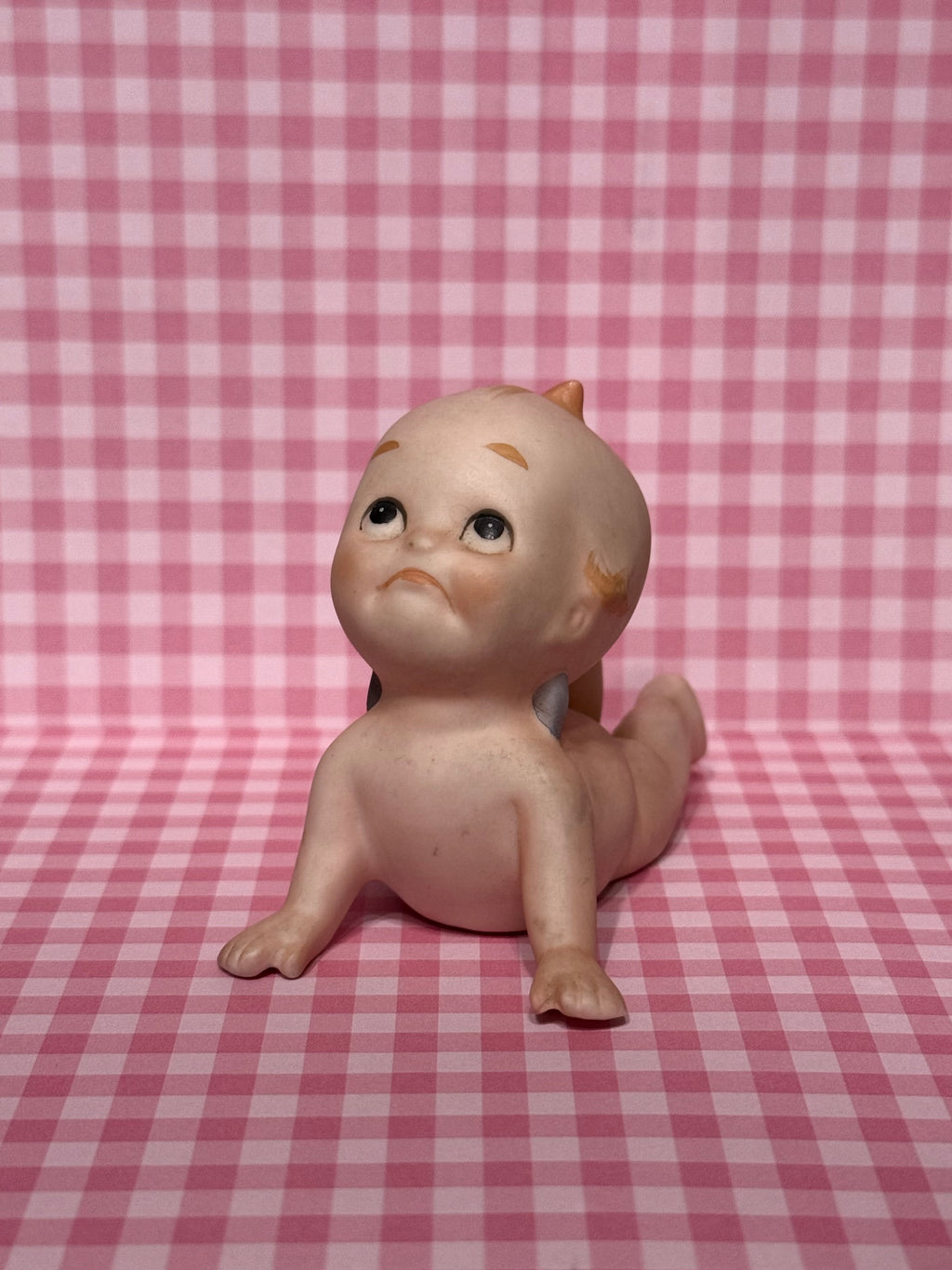Laying Kewpie