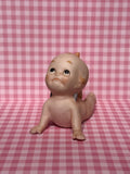 Laying Kewpie