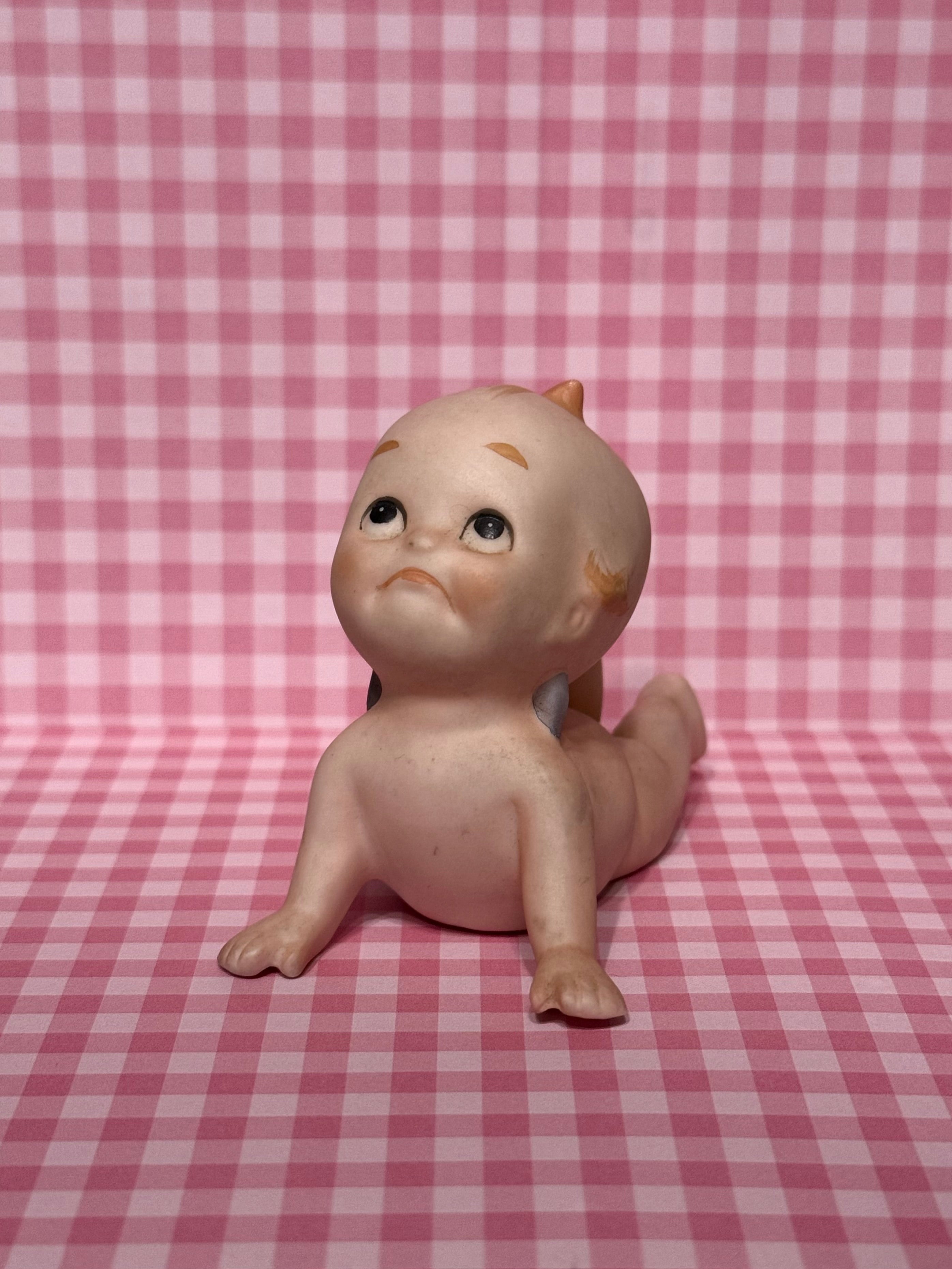 Laying Kewpie