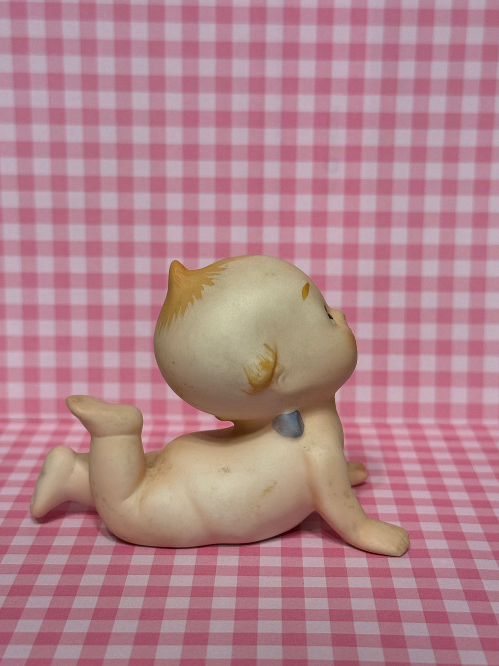 Laying Kewpie