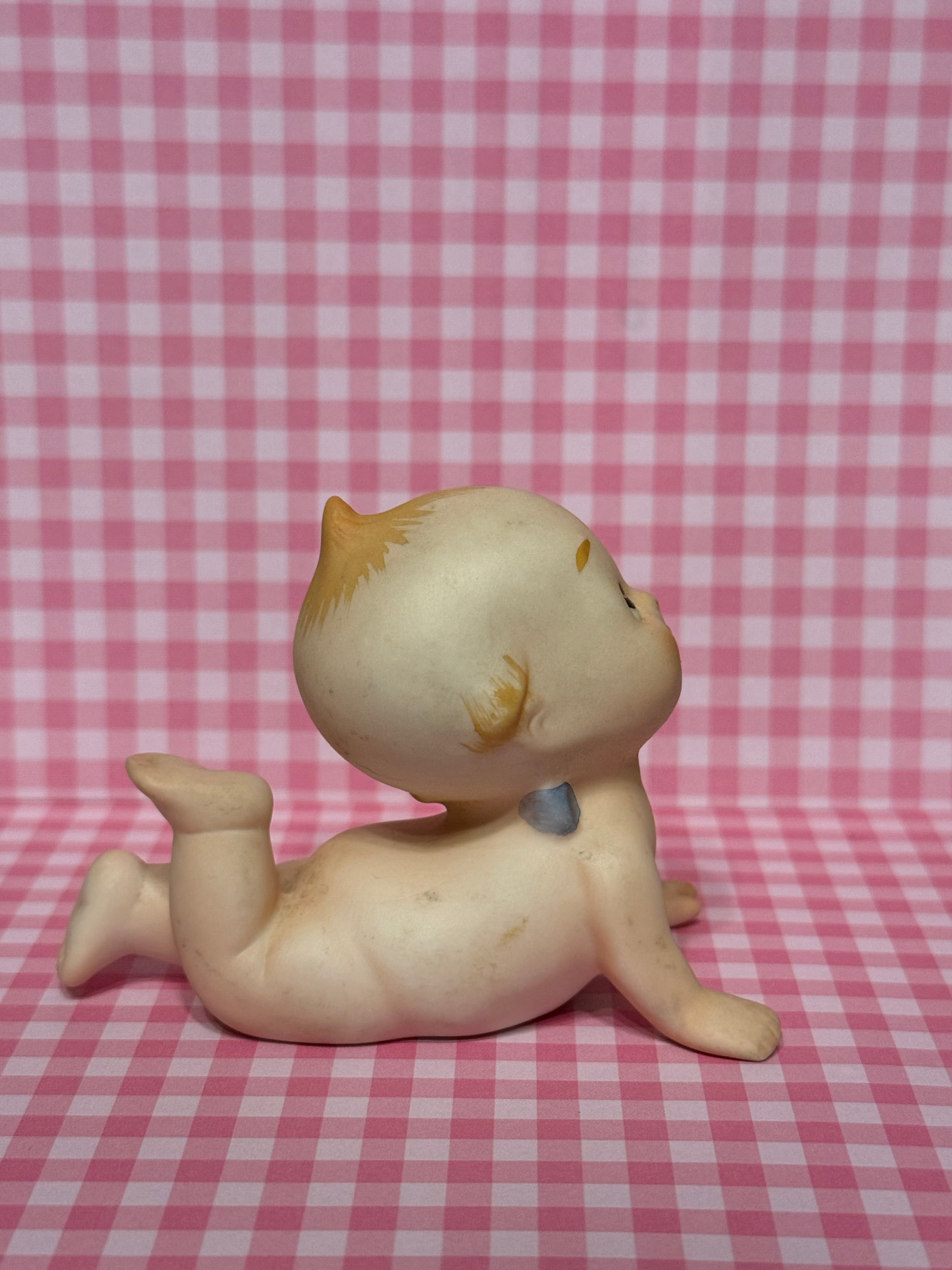 Laying Kewpie
